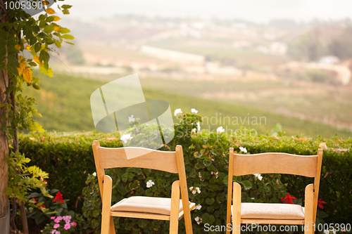 Image of Patio Chairs Overlooking the Country