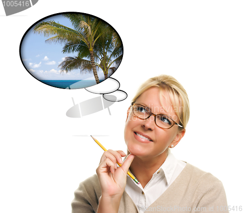Image of Beautiful Woman with Thought Bubbles of a Tropical Place
