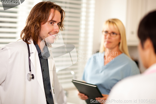 Image of Doctors and Nurses Having Conversation