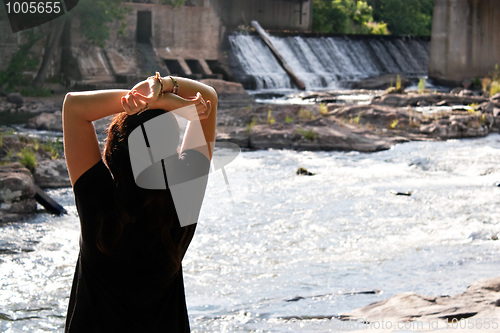 Image of Brunette by the River