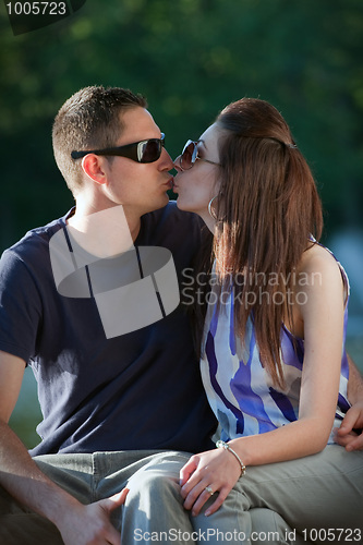 Image of Young Couple Kissing