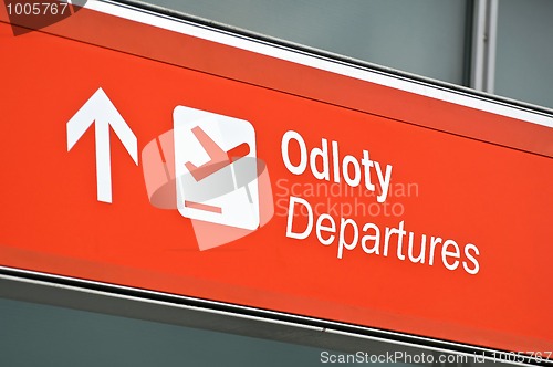 Image of Airport departure sign.