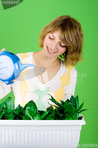 Image of girl watering flowers