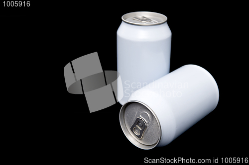 Image of Two white beverage cans