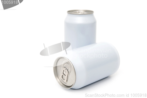 Image of Two white beverage cans