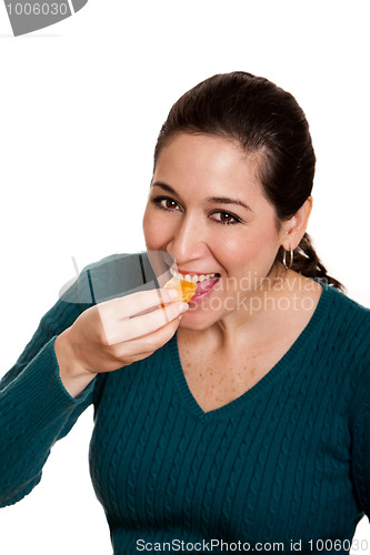 Image of Eating mandarin orange slice