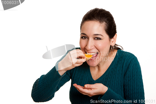 Image of Eating juicy mandarin orange slice