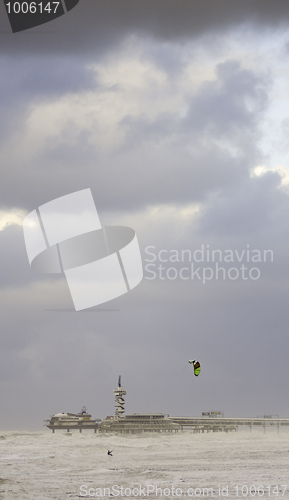 Image of Kite surfing on a stormy day
