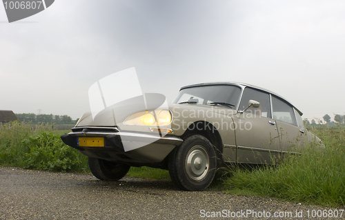 Image of Classic Car on Vintage Road