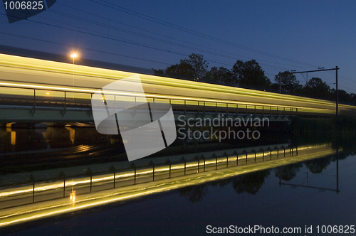 Image of Reflection of a passing train