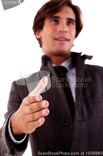 Image of handsome business man, with the arm extended for a handshake