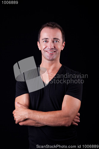 Image of Portrait of a handsome middle-age man smiling