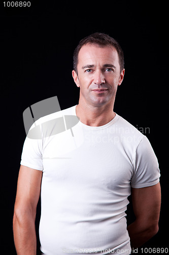 Image of Portrait of a handsome middle-age man smiling