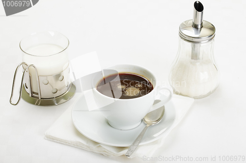Image of Espresso with milk and sugar