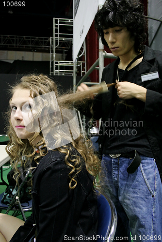 Image of Model having her hair styled