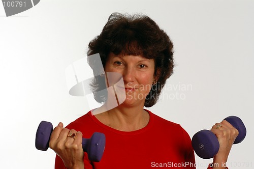 Image of beautiful woman in fitness gym