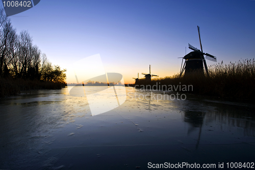 Image of Windmills at sunrise