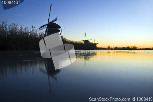 Image of Thee windmills in Wintertime