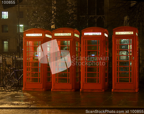 Image of Phone boxes at night