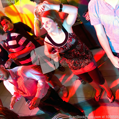 Image of Dancing woman in a nightclub