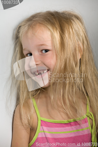 Image of little girl without one front tooth