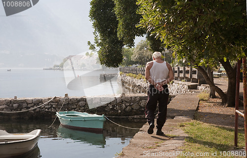 Image of Fisherman walking