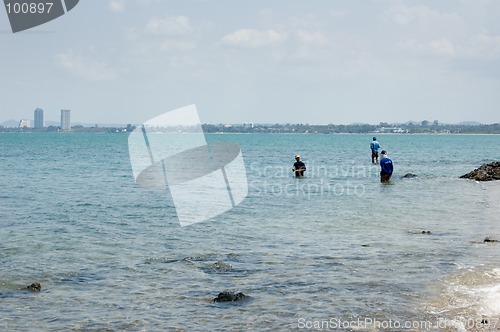 Image of Three People Fishing