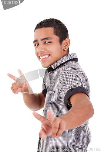 Image of Young latin man with thumbs raised as a sign of victory