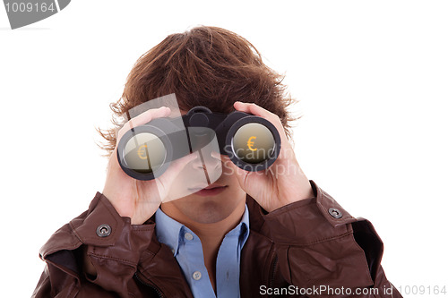 Image of Young man looking through binoculars, with symbol of money