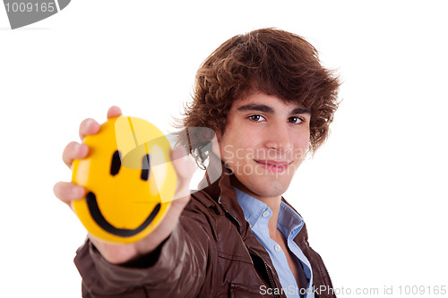 Image of man with a yellow smile face on hand