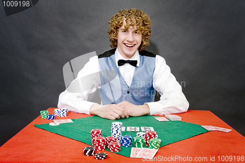 Image of Smiling poker dealer