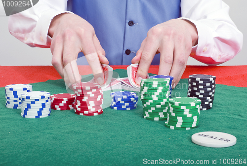 Image of Smiling poker dealer