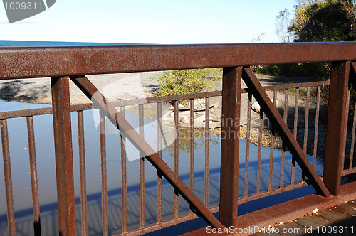 Image of Rusty pedestrian bridge.