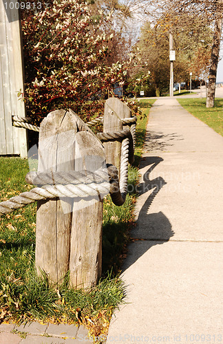 Image of Fencepost with big rope.