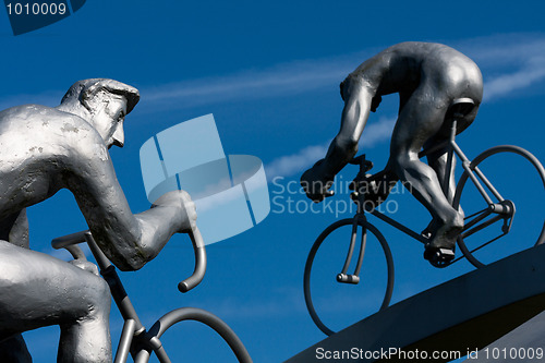 Image of Two cyclists climbing