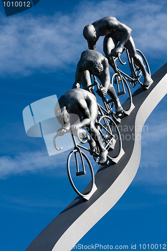 Image of Three cyclists in a slope