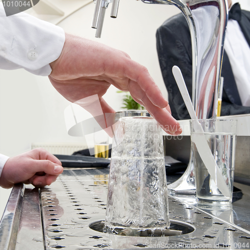 Image of rinsing a glass