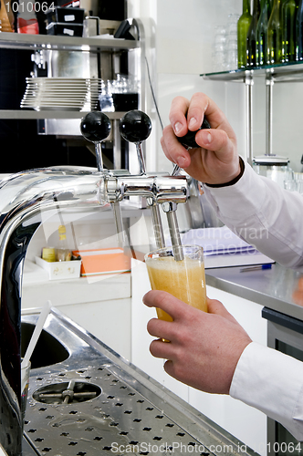 Image of Pouring a beer