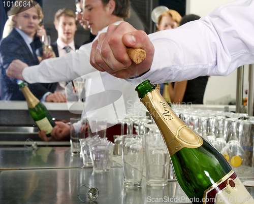 Image of Opening a bottle of Champagne