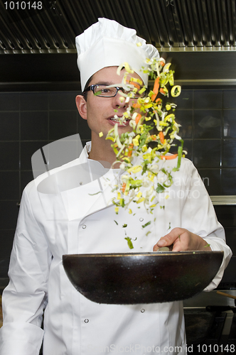 Image of Flipping vegetables