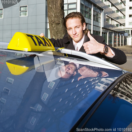 Image of Smiling taxi driver