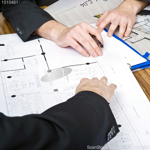 Image of Discussing architectural plans