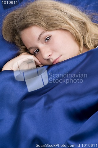 Image of young girl in bed