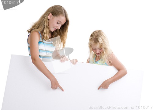 Image of girls with blank sign