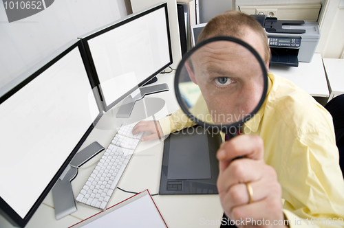 Image of Watchful businessman