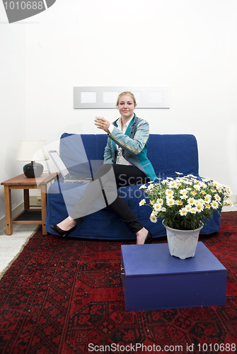 Image of Woman on couch