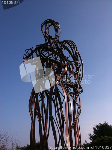 Image of steel man on Llanbedrog cliffs