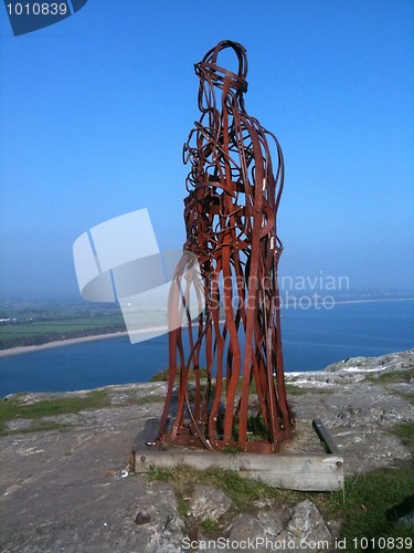 Image of steel man on Llanbedrog cliffs