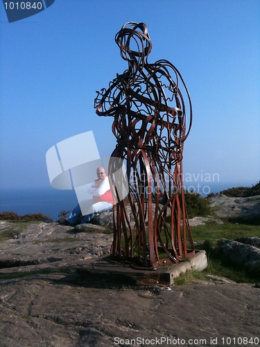 Image of steel man on Llanbedrog cliffs