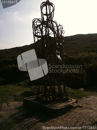 Image of steel man on Llanbedrog cliffs